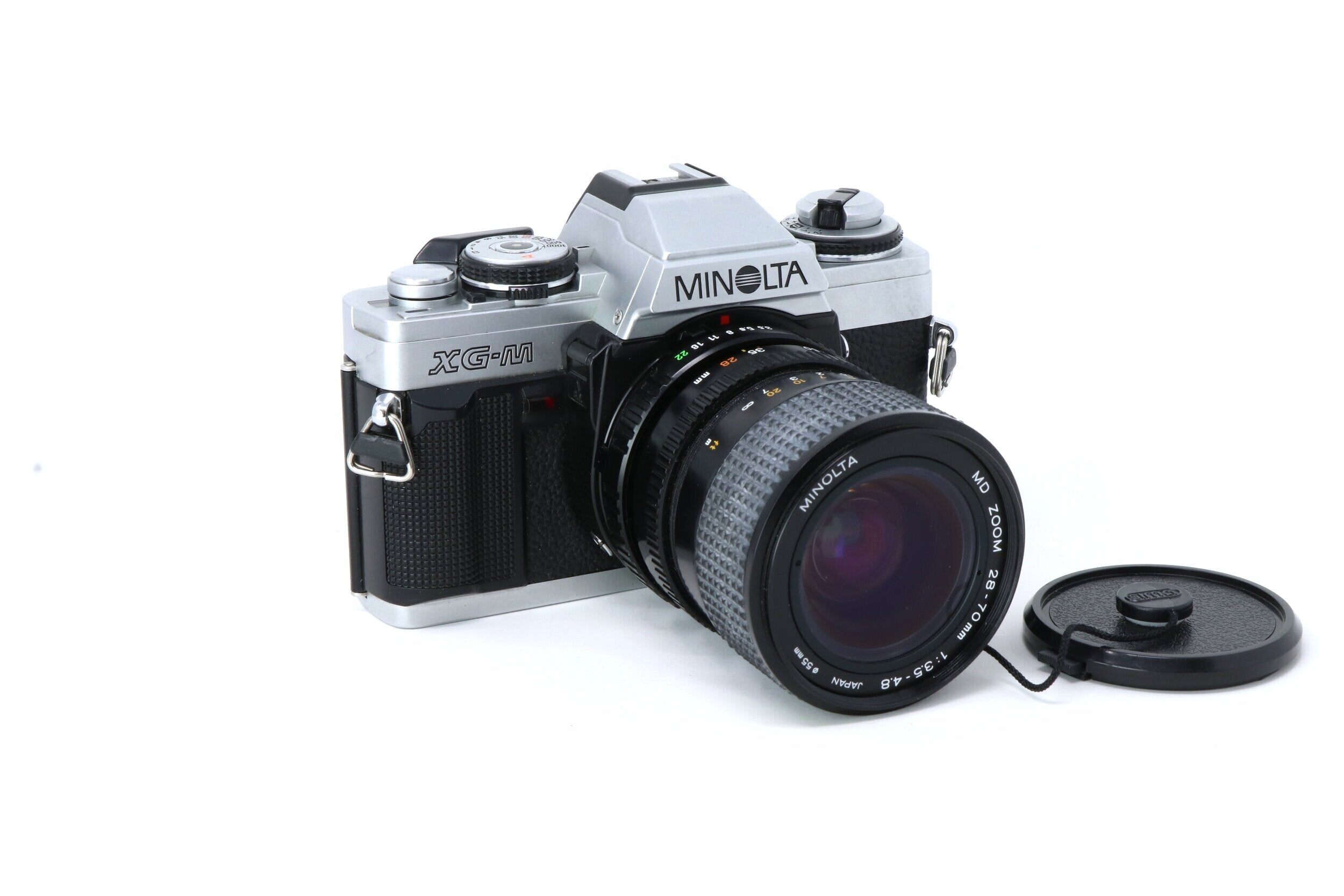 Vintage Minolta XG-M 35mm Film Camera top with 135mm Lens