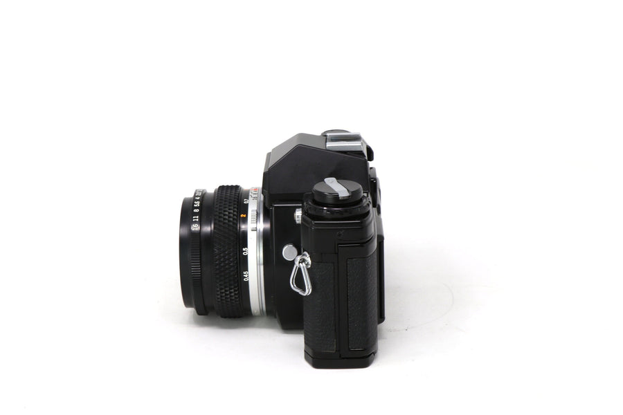 Olympus OM-10 35mm Film Camera with 50mm lens (Black)